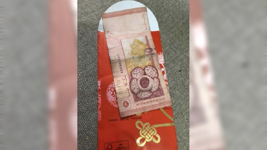 馬來西亞一名女子抱怨紅包內竟然裝舊鈔，認為這是在觸霉頭。(圖／翻攝自星洲網)