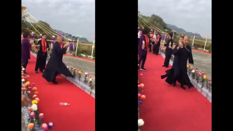 惠嚴法師以旋轉灑水的方式祈福。圖/翻攝自惠嚴法師臉書專頁影片