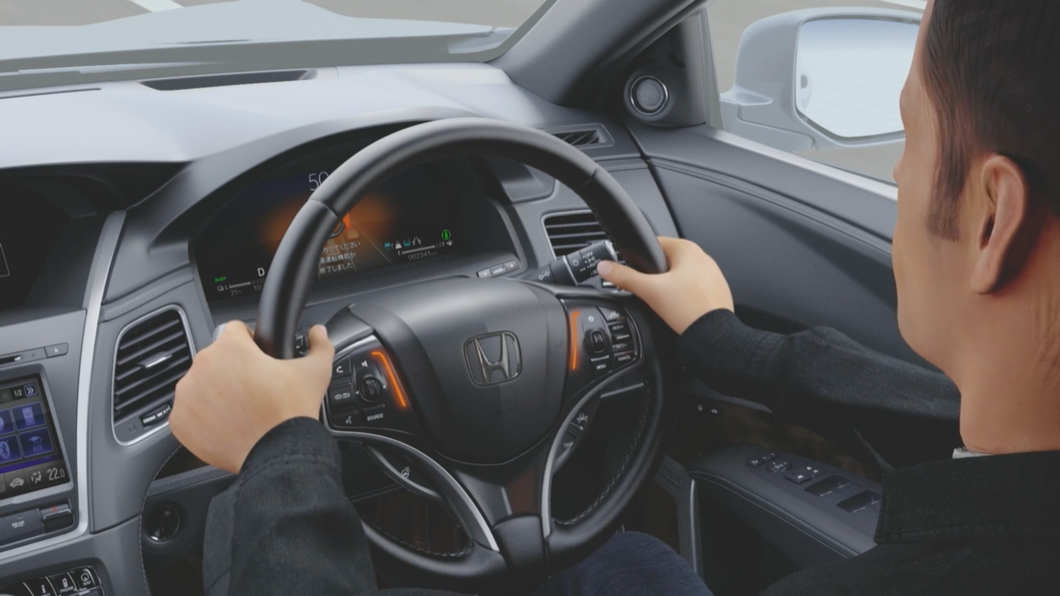 如果系統需要駕駛接管操作時，則是會發出橙色燈號。(圖片來源/ Honda)