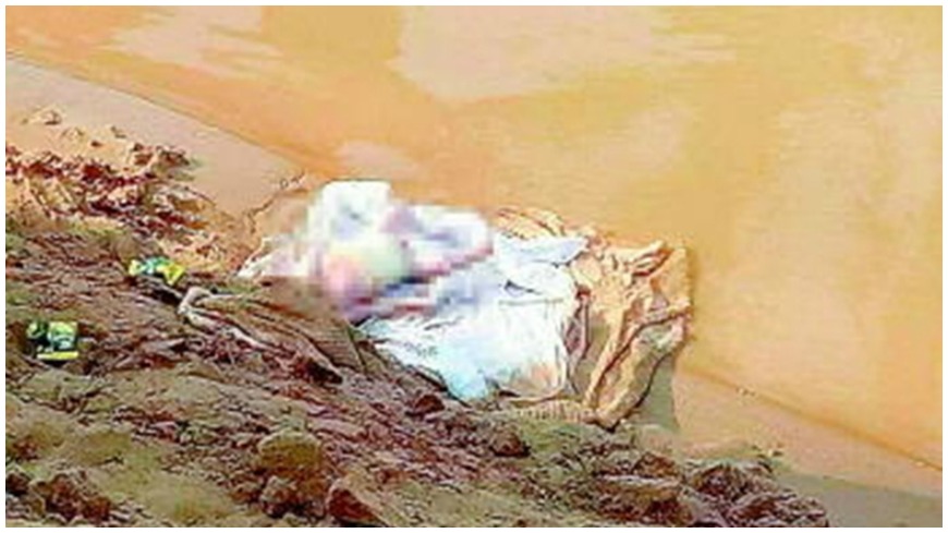 嚇！山東省有遊客在河邊釣魚，竟釣到雙胞胎嬰屍。（圖／翻攝自騰訊網）