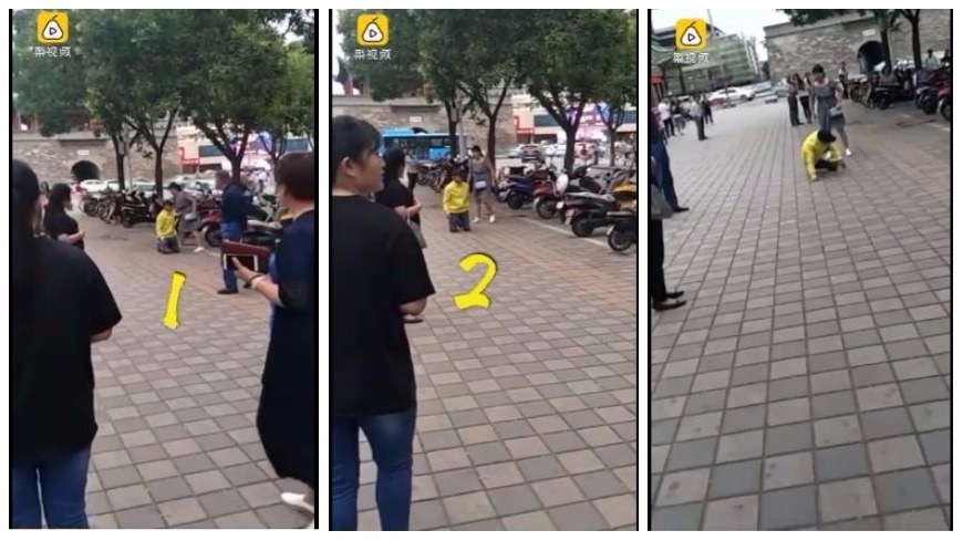 大陸甘肅一名男子在大街上向女友下跪求饒，短短90秒內就下跪5次。(圖／翻攝自梨視頻)