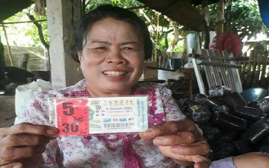 泰國一名婦人以為自己中了3千萬泰銖的頭獎，事後得知一切都是13歲孫女的惡作劇。(圖／翻攝自臉書)