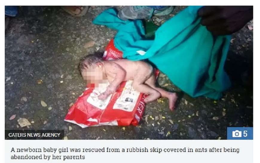 印度一名女嬰遭狠心父母棄置在垃圾桶，全身遭到螞蟻啃食。(圖／翻攝自太陽報)