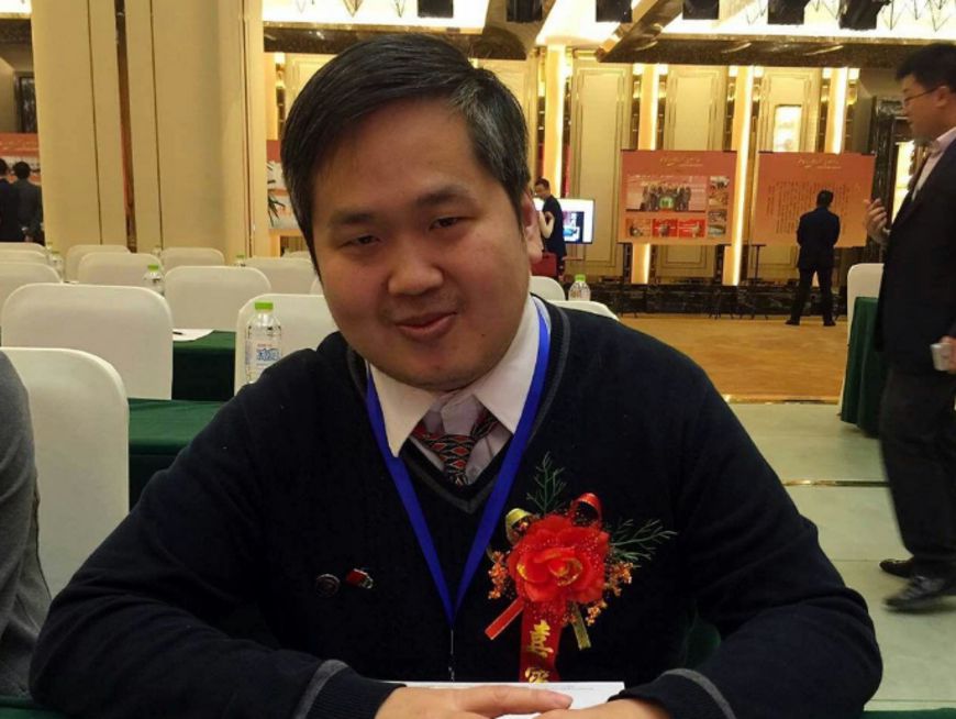 39歲的王裕慶目前在北京大學攻讀博士班。圖／翻攝自庆哥评论简书