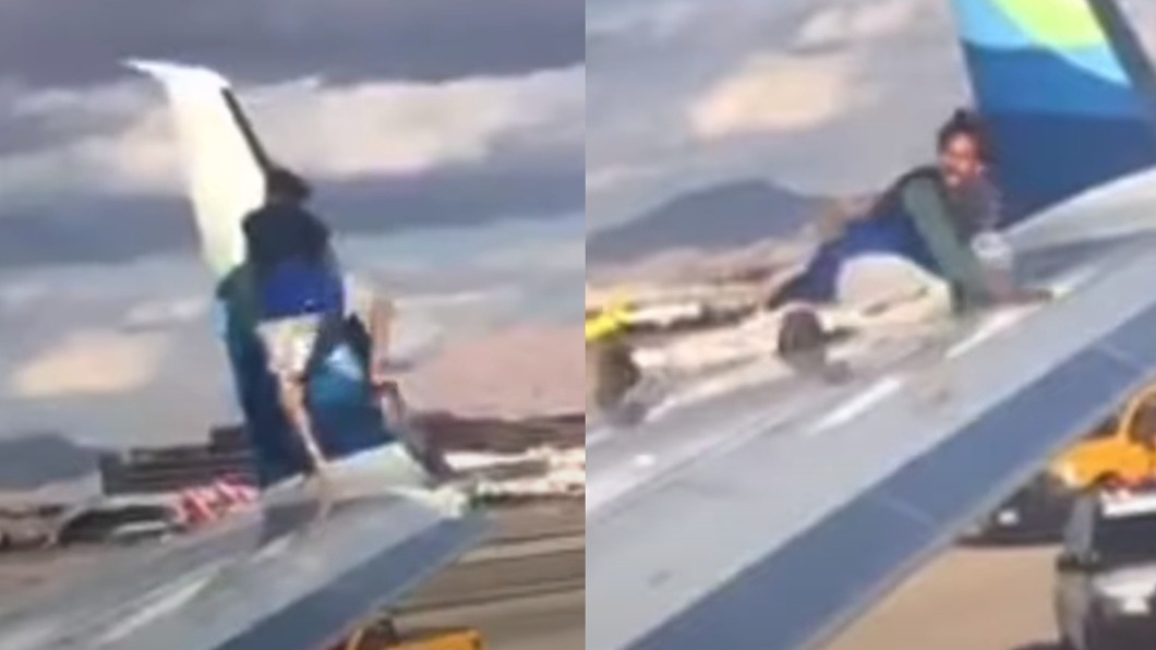 男子躲避機場保安爬上機翼。（圖／翻攝自Prashant AviationTrip YouTube）