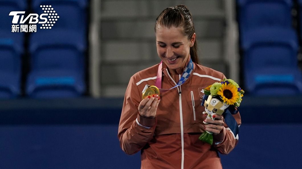 瑞士女將班西琪在東奧網球女子單打奪冠。（圖／達志影像美聯社）