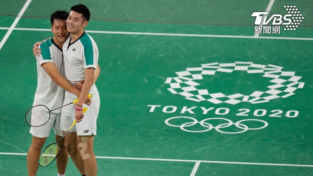 李洋（左）、王齊麟（右）勇奪東京奧運羽球男雙金牌。（圖／達志影像美聯社）
