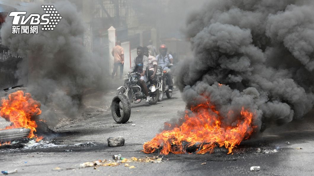 海地爆發示威，要求總理下台。（圖／達志影像路透社）