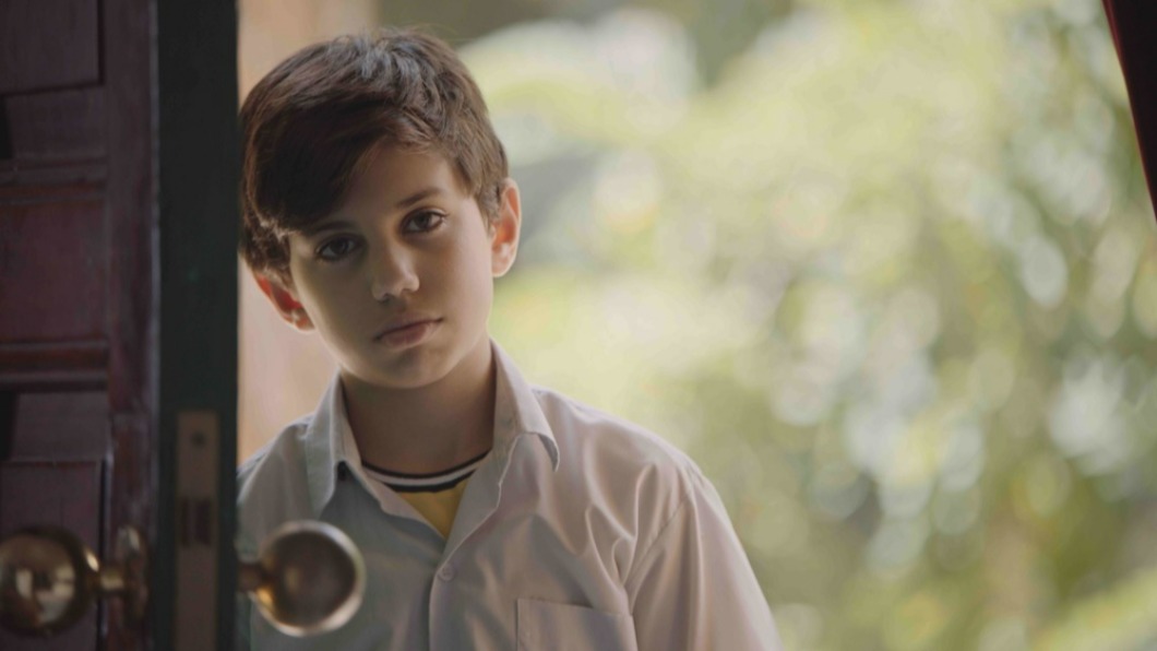 穆罕默德達利在電影《黎巴嫩的天空》中，飾演情竇初開的小男孩威桑。（圖／台北双喜提供）