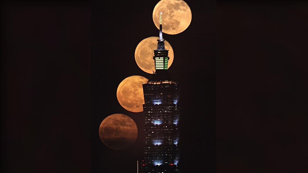吳昆臻先生拍攝滿月與台北101大樓。（圖／翻攝自台北市立天文科學教育館官網）