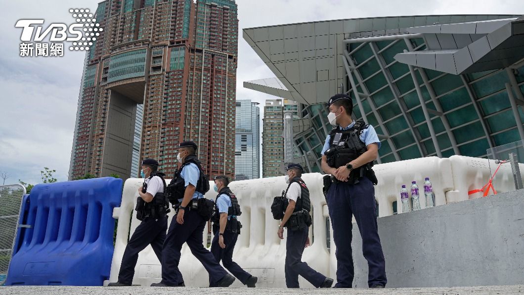 今天是香港回歸25週年，港警加強維安。（圖／達志影像美聯社）