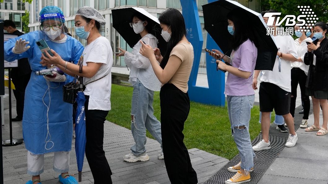 北京居民隔離被要求戴電子手環引發爭議。（圖／達志影像美聯社）