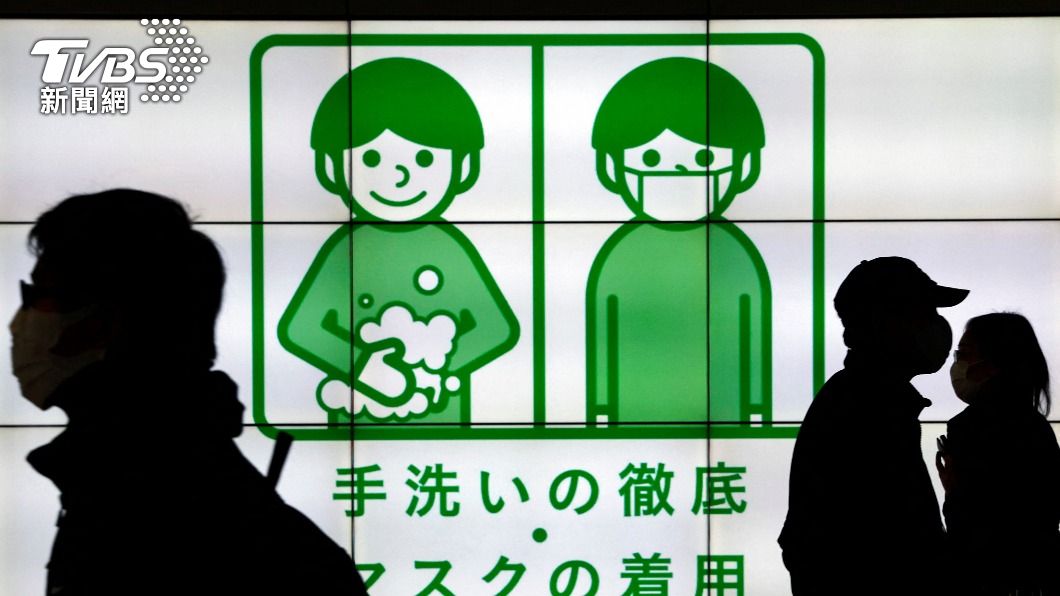 日本討論調降COVID-19分類等級。（圖／達志影像路透社）