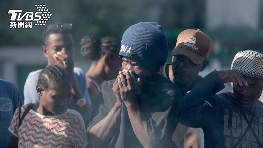 海地百姓動用私刑砸死多名黑幫分子。（圖／達志影像美聯社）