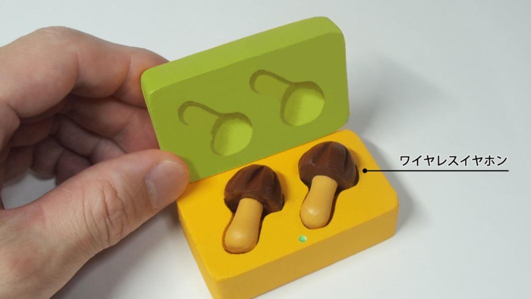 Meiji發布「蘑菇山巧克力餅」無線耳機，造型超吸睛。（圖／翻攝自株式会社 明治 / meiji twitter）