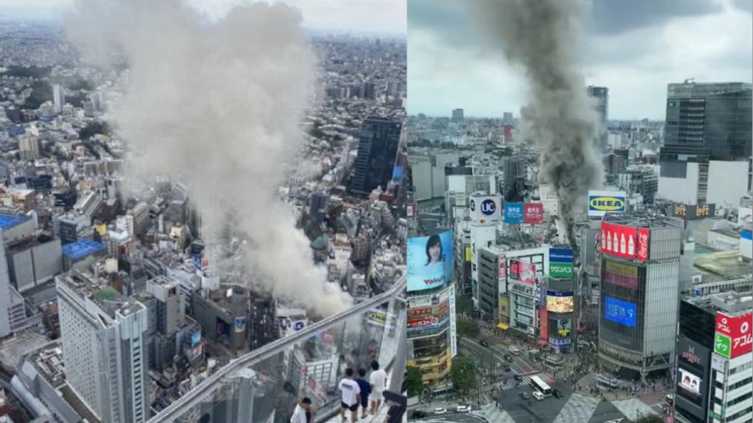 站在澀谷著名的十字路口前，可以看到建築物間飄出大量濃煙。（圖／翻攝自@XMaster090、@captainCFX推特）