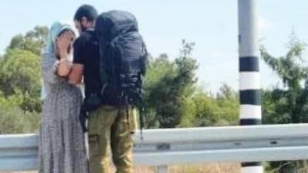 以色列男子被迫離開孕妻奔赴戰場。（圖／翻攝自@InbarCohen13　Twitter）