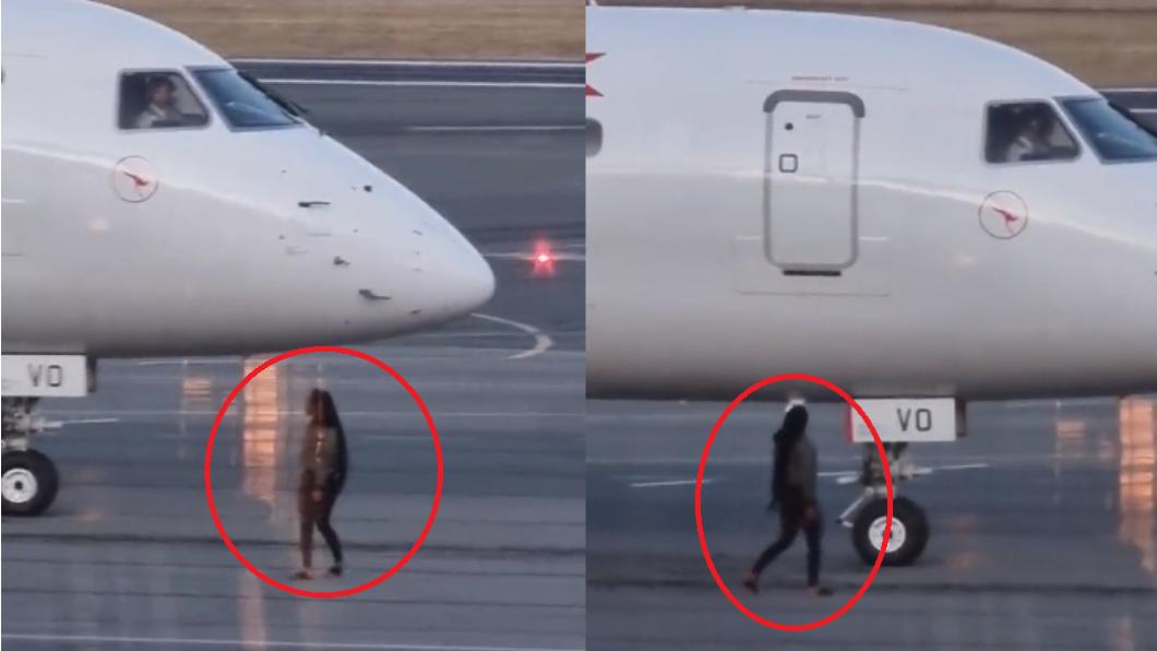 女子走到飛機跑道上試圖引起機師的注意。（圖 / 翻攝自X）