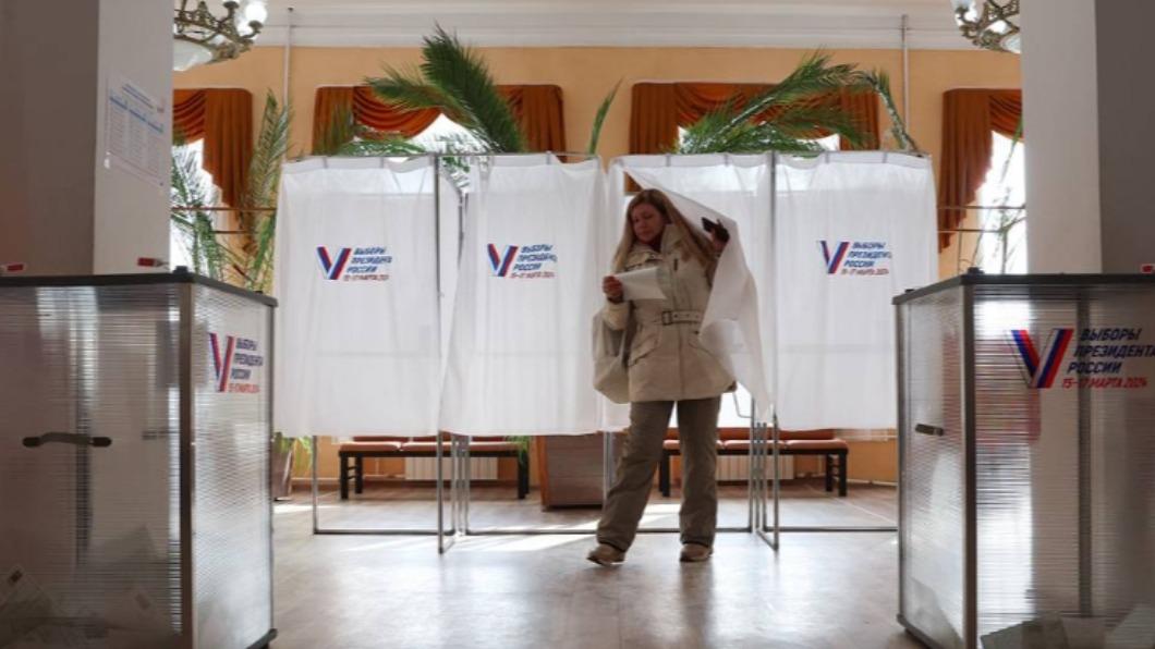 俄羅斯總統大選今天結束，出口民調顯示普欽（Vladimir Putin）以87%選票輕鬆邁向下個6年任期。（圖／翻攝塔斯社）