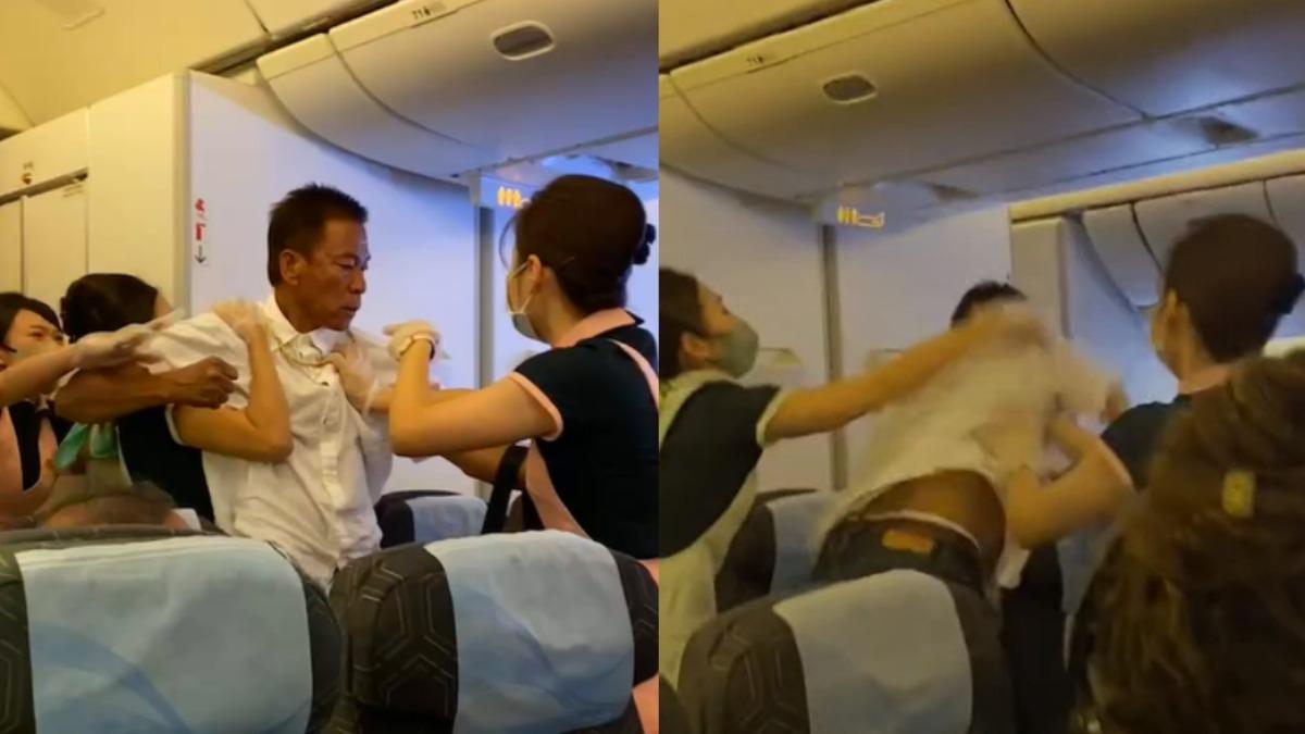 長榮航班上旅客為搶座位而大打出手。（圖／翻攝自記者爆料網）