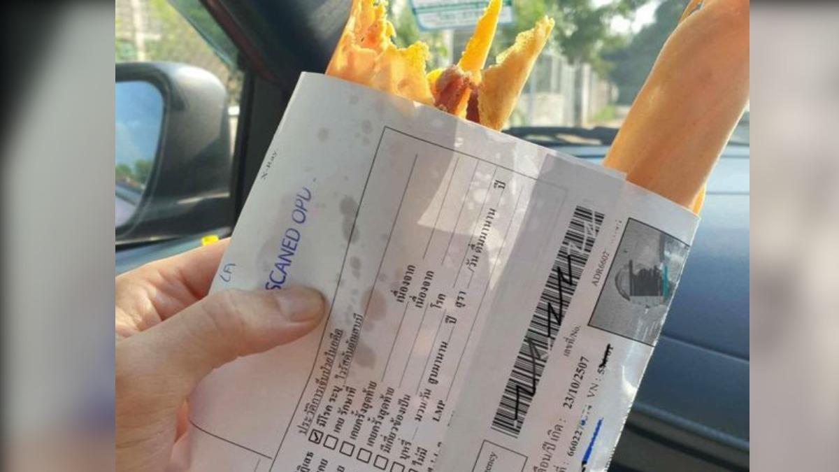 泰國有名民眾買小吃發現包裝竟是病歷單。（圖／翻攝自臉書）