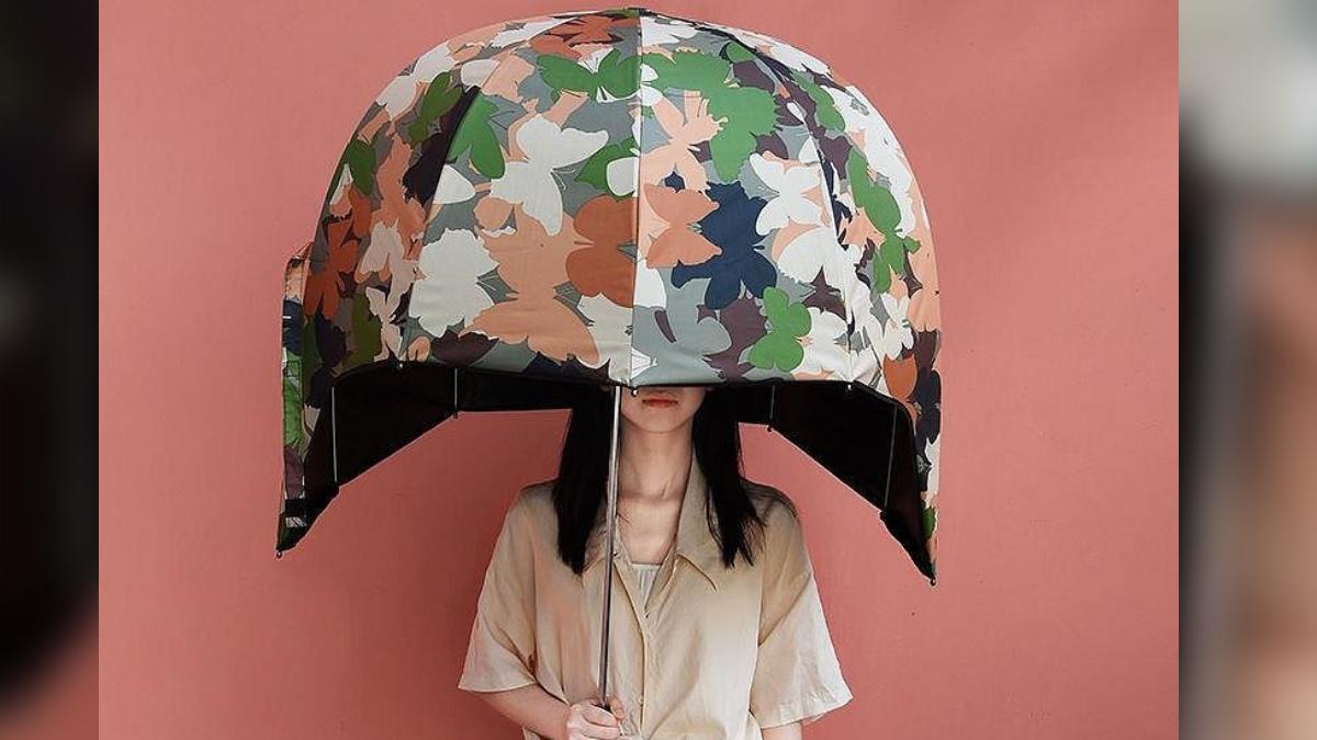 電商平台推出超大雨傘，網友笑稱像移動式頭盔。（圖／Yahoo奇摩拍賣提供）