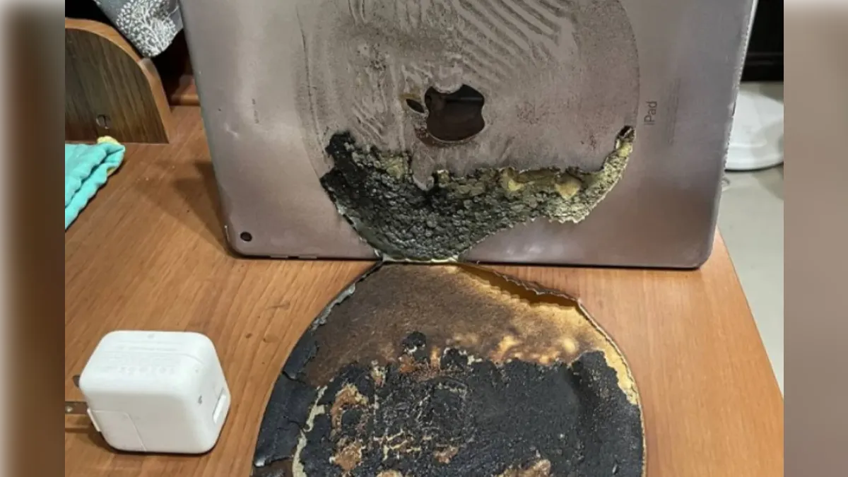 網友透露在家充電iPad 5平板電腦，沒想到居然自燃，將木桌燒出大洞。（圖／翻攝自PTT）
