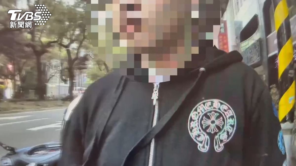 李男表情緊張、眼神飄忽不定。（圖／TVBS）