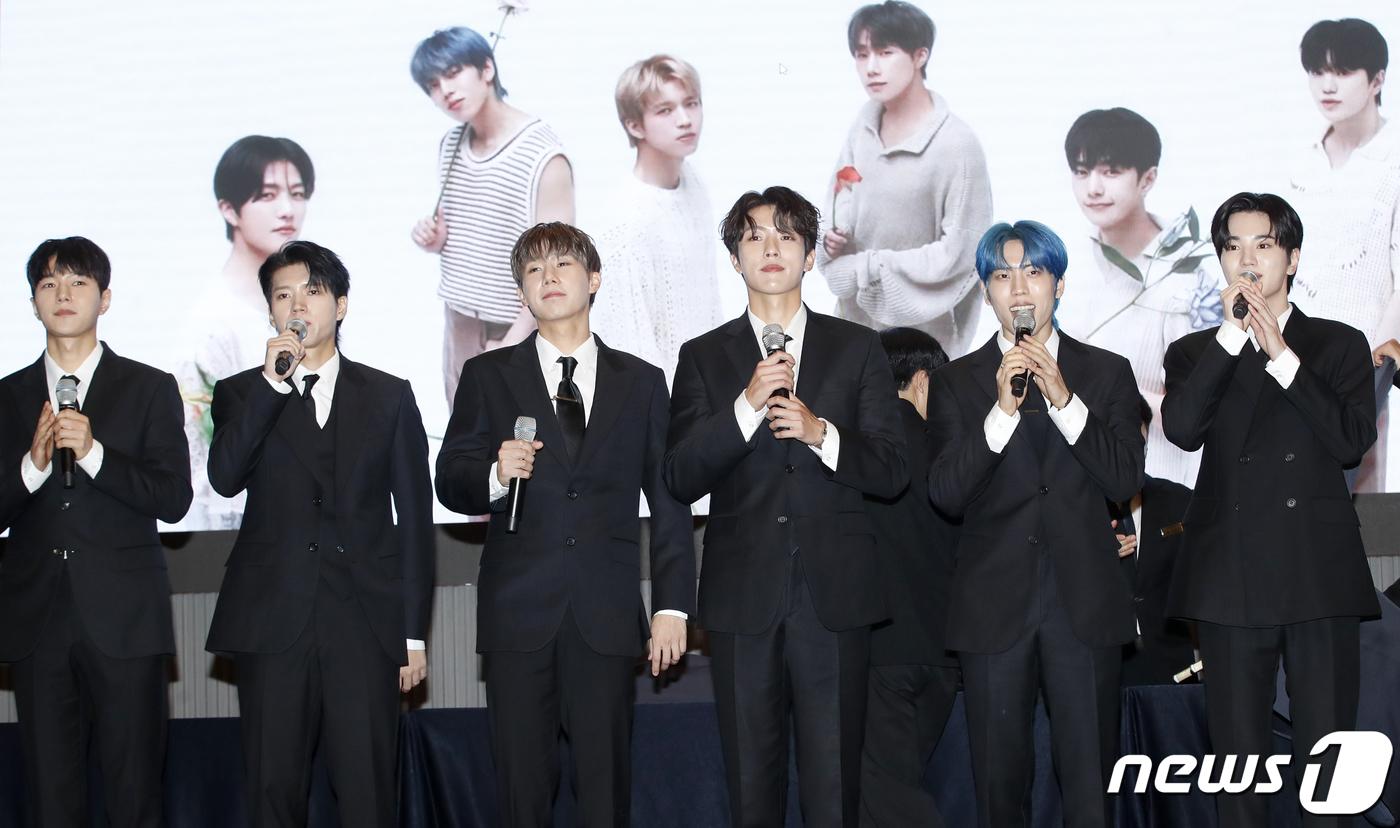 金聖圭的姊姊離開，INFINITE成員也陪伴他度過難關。（圖／news1提供）