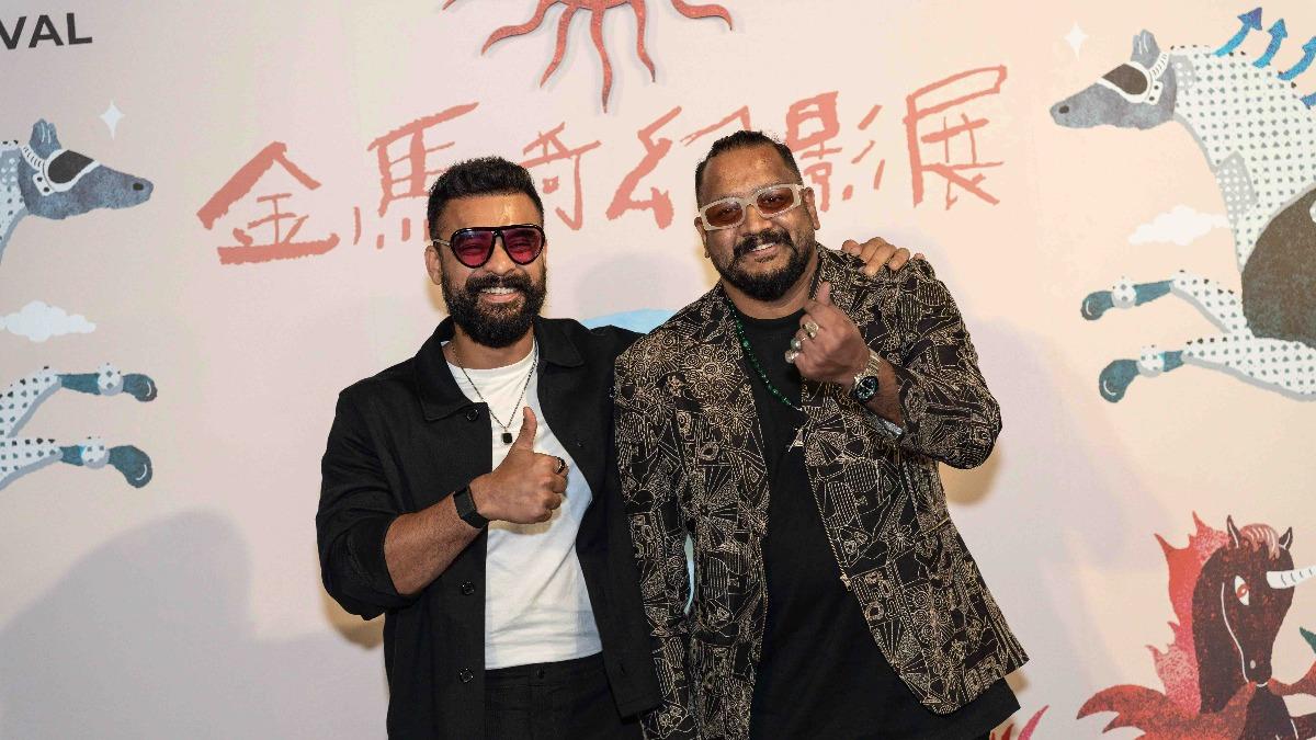 托維諾湯瑪斯（左）及導演吉辛拉爾。（圖／金馬執委會提供）