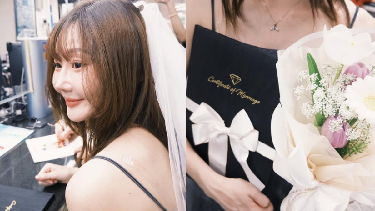 朱朱手捧鮮花和結婚證書。(圖／翻攝自piglet_lu IG）