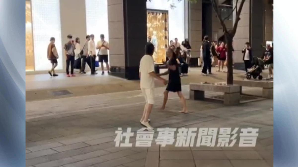街頭表演？北市信義區香堤大道　2男繞圈圈互毆