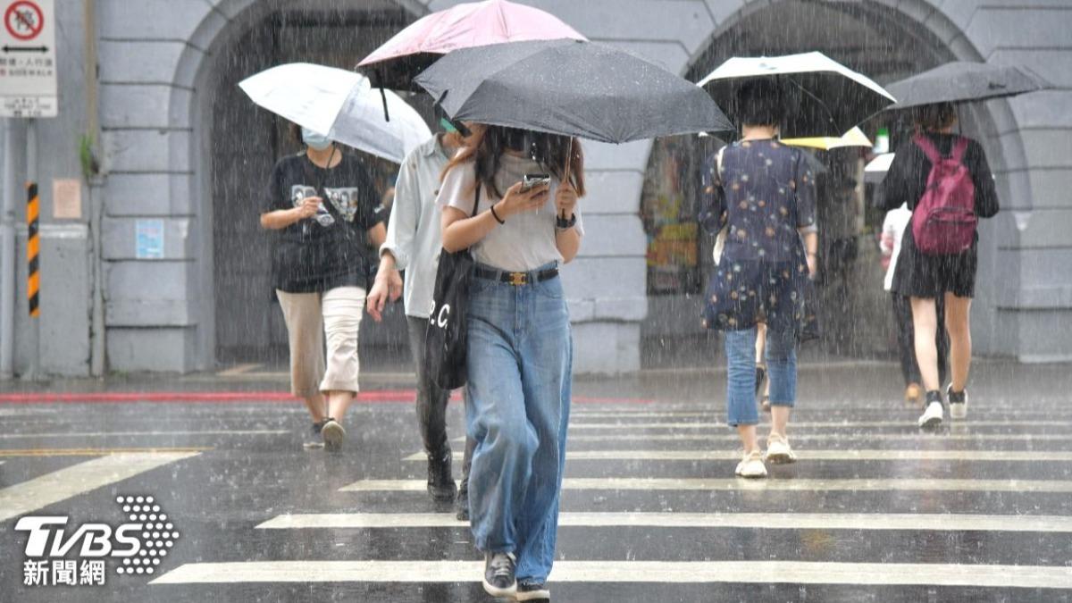 Taiwan issues heavy rain warnings as temperatures soar
