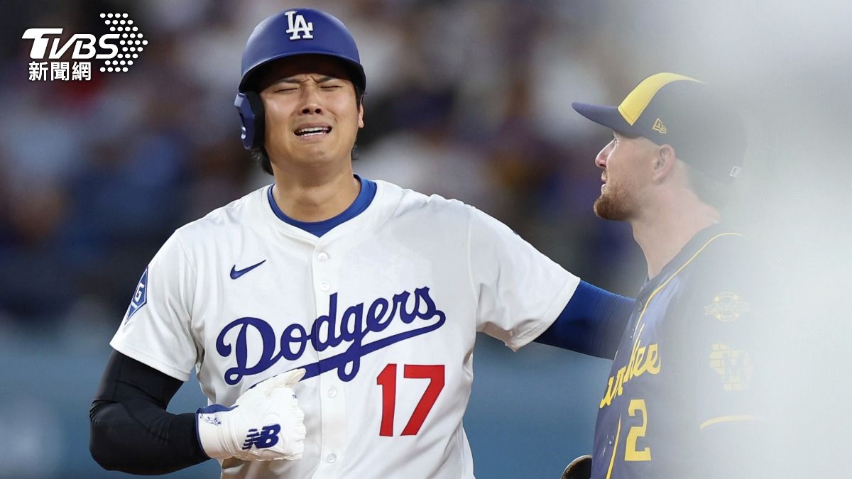 大谷翔平盜壘時腹部挨球吻，表情一度看起來十分痛苦。（圖／達志影像美聯社）