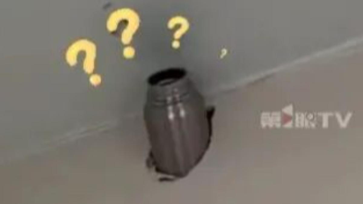 保溫杯恐成炸彈!陸男「熱水加清潔劑旋緊」 下秒噴飛插進牆